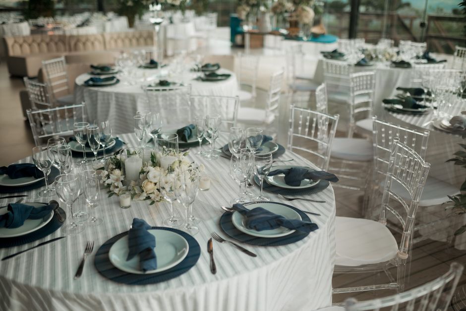 Elegant wedding table setting with fine china and centerpieces